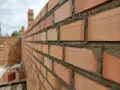 Jak długo schnie zaprawa klejowa? Poznaj kluczowe czasy schnięcia