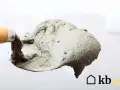 Łopata z zaprawą cementową. Zastanawiasz się, ile kosztuje worek cementu na budowę?