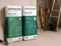 Dwa worki kleju do płytek OPTOLITH Elastic T60 i Elastic Easy. Jaki klej do płytek wybrać? Oba to elastyczne kleje klasy C2TE.