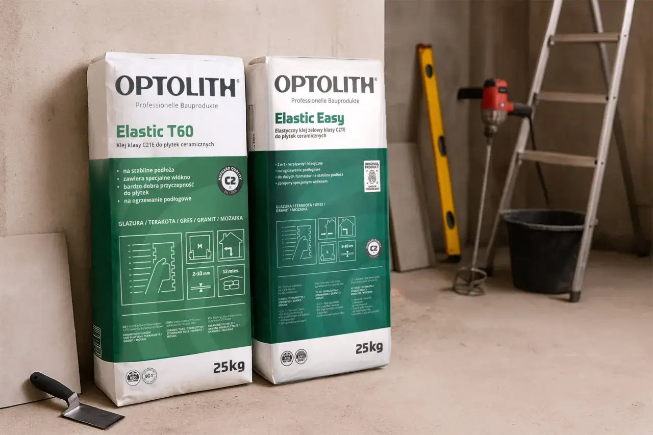 Dwa worki kleju do płytek Optolith Elastic T60 i Elastic Easy. Idealny klej do płytek ceramicznych na ogrzewanie podłogowe.